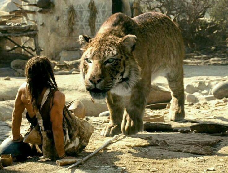 Human and Sabertooth tiger